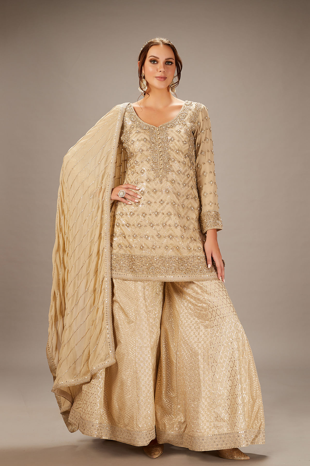 Buy Beige Georgette Palazzo Suit With Sequins Work And Leaf Neck Online at Samyakk