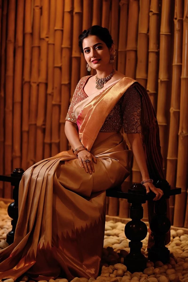 Ashika Ranganath in Gold Saree