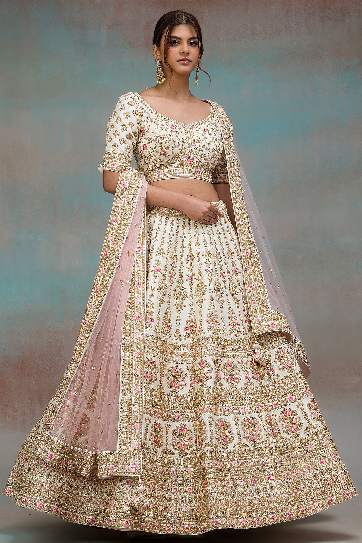 Buy Cannoli Cream Sequins Embroidered Raw Silk Bridal Lehenga Online at Samyakk