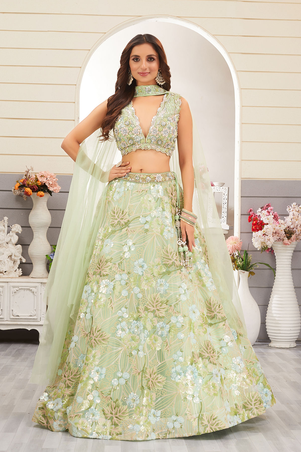 Buy Green Designer Lehenga with Heavy Embroidery and Deep V Neck Blouse Online at Samyakk