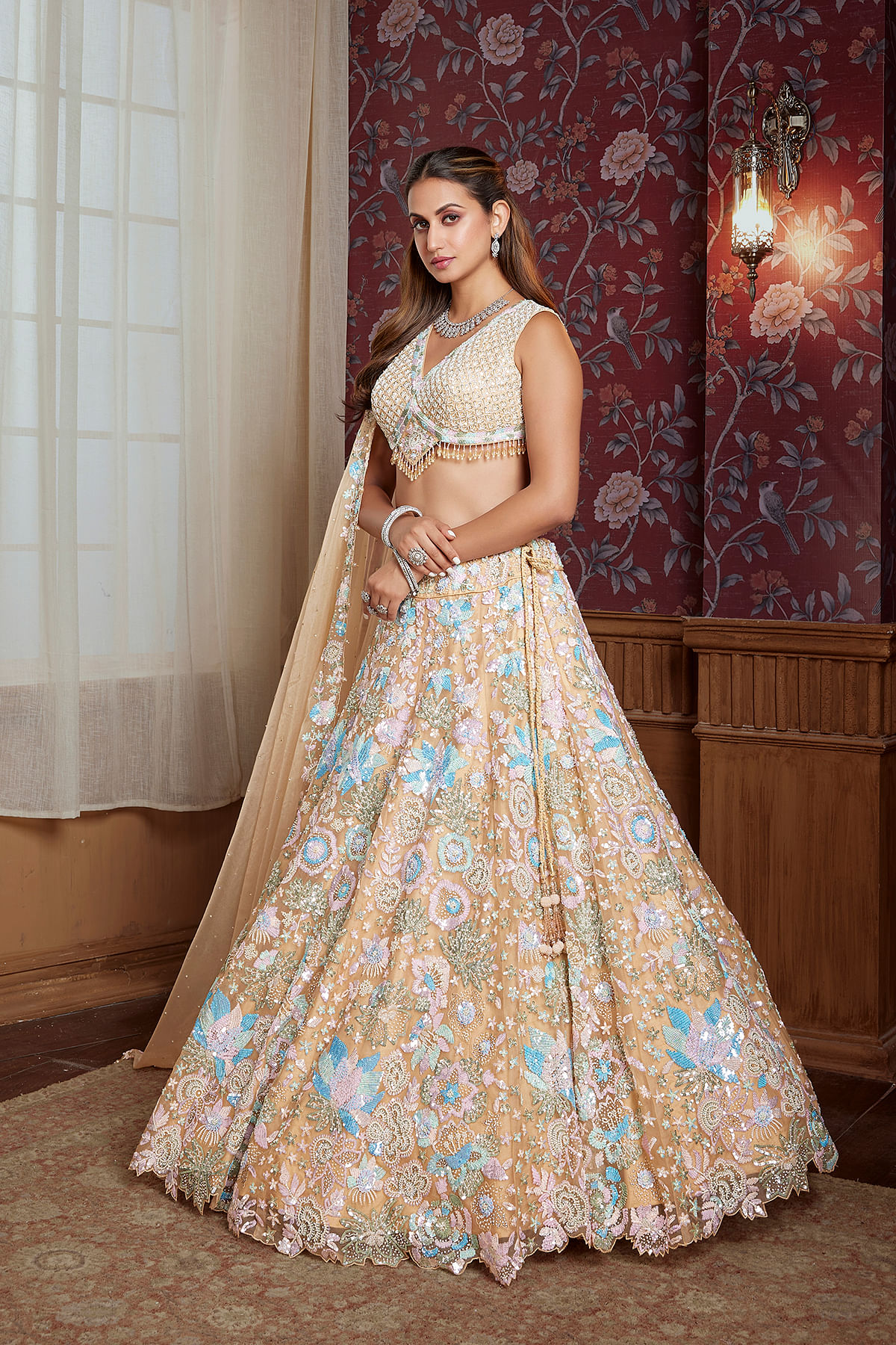 Buy Light Peach Panel Style Net Engagement Lehenga With Embroidered V Neck Blouse Online at Samyakk