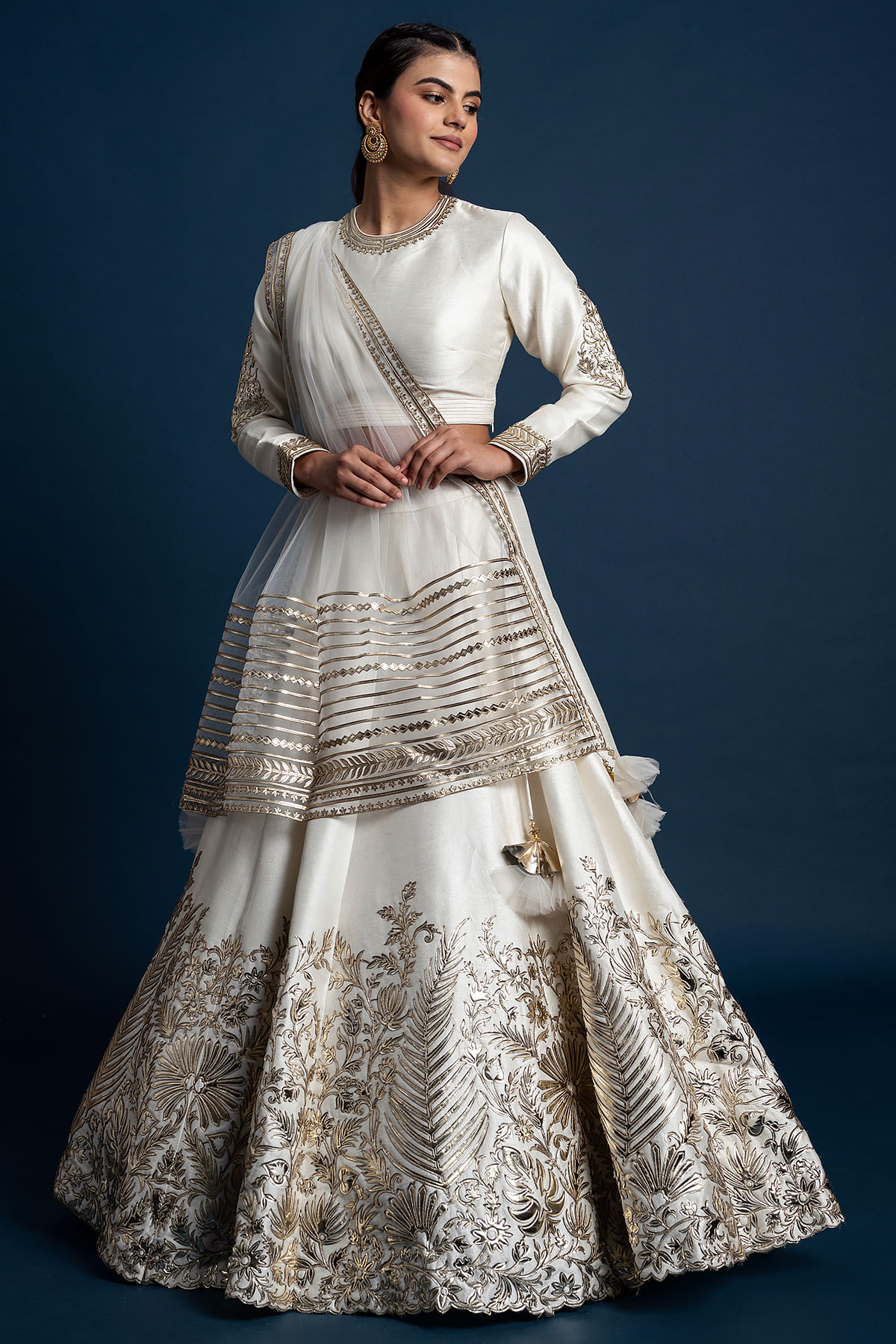 Buy Off-White Metallic Embroidered Raw Silk Engagement Lehenga Online at Samyakk