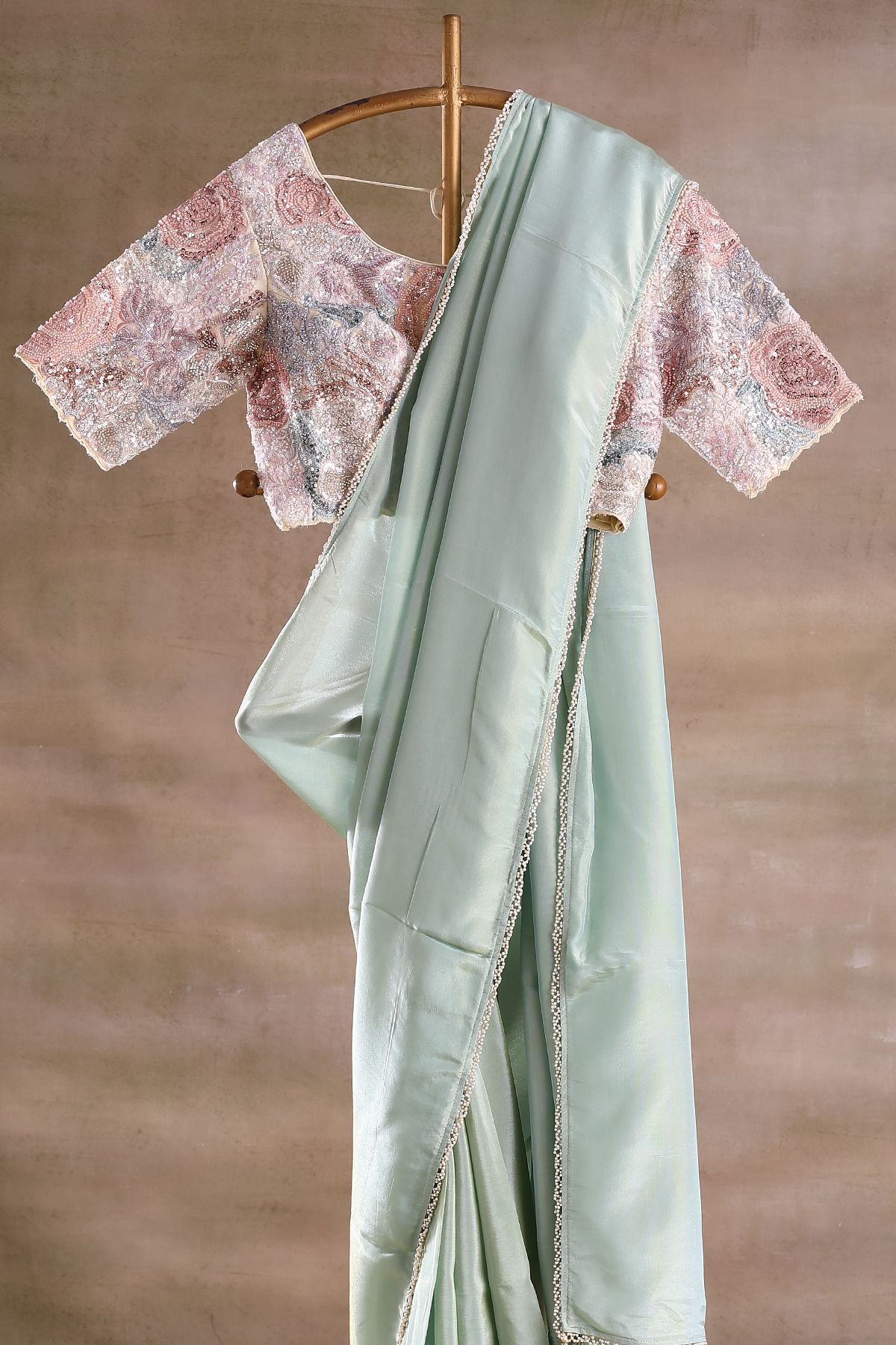 Green Tissue Saree with Stitched outlets Blouse