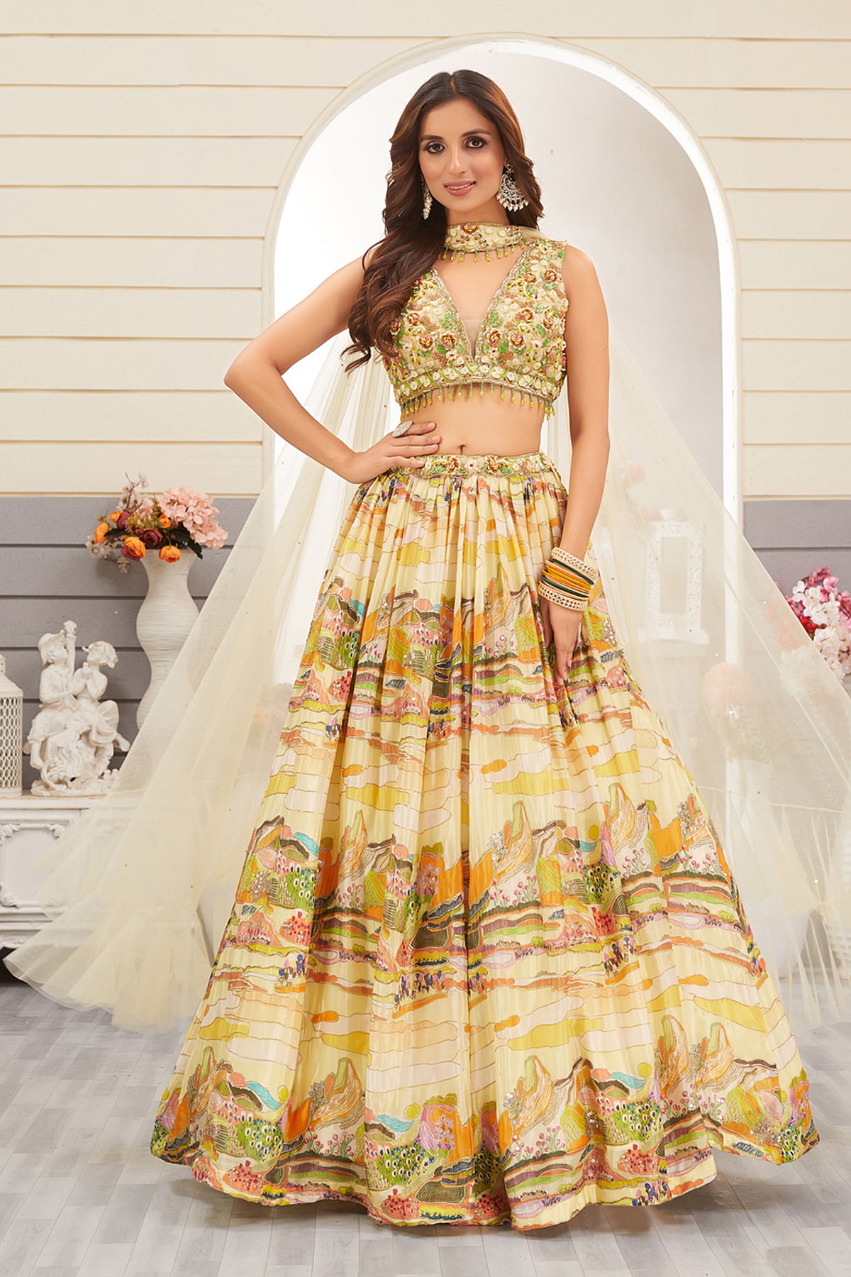 Buy Pastel Yellow Printed Crepe Party Wear Lehenga Online at Samyakk