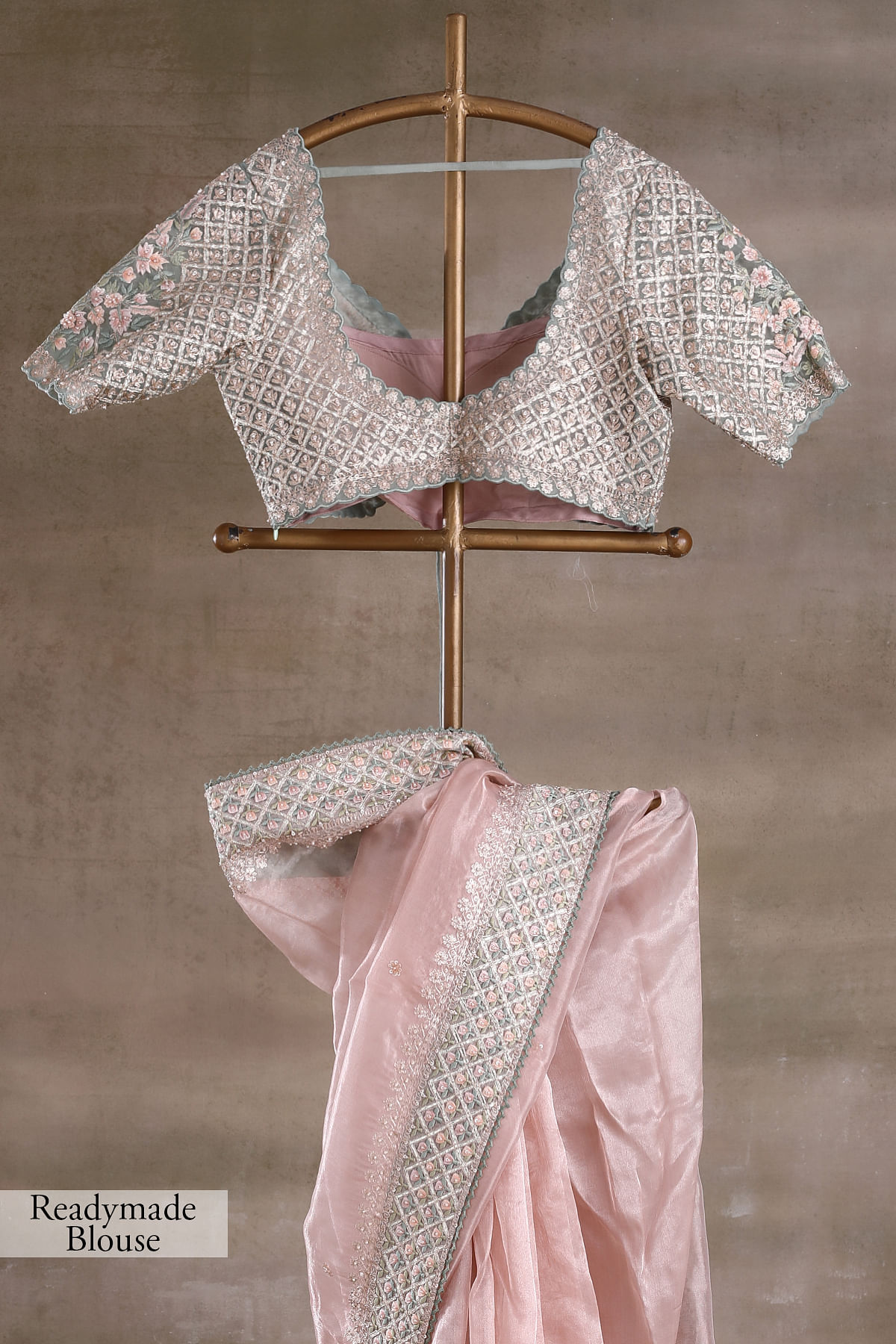 Light pink blouse with sequin, offers pearls, silver zari work