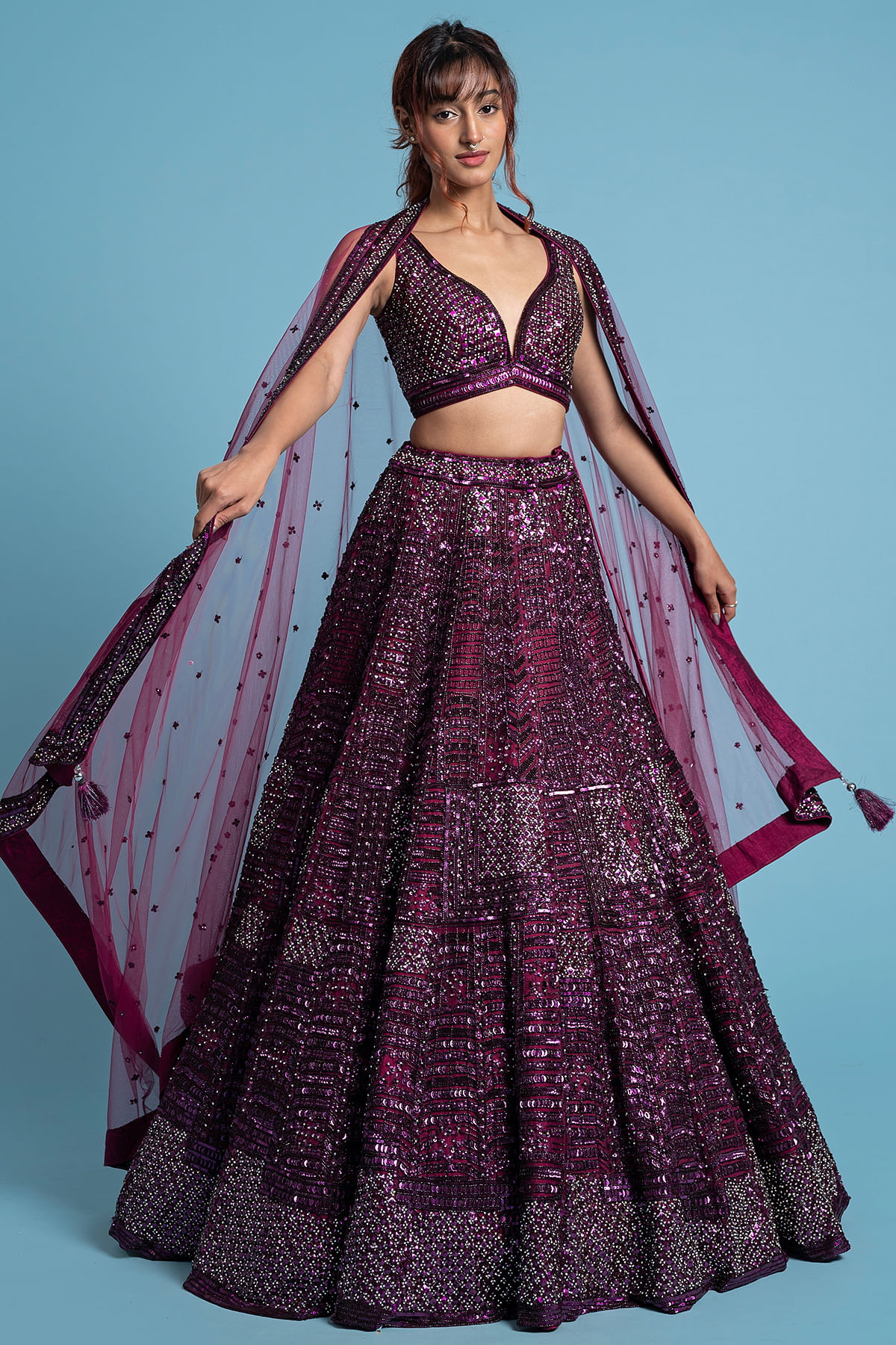 Buy Plum Purple Sequins Embroidered Net Reception Lehenga Online at Samyakk