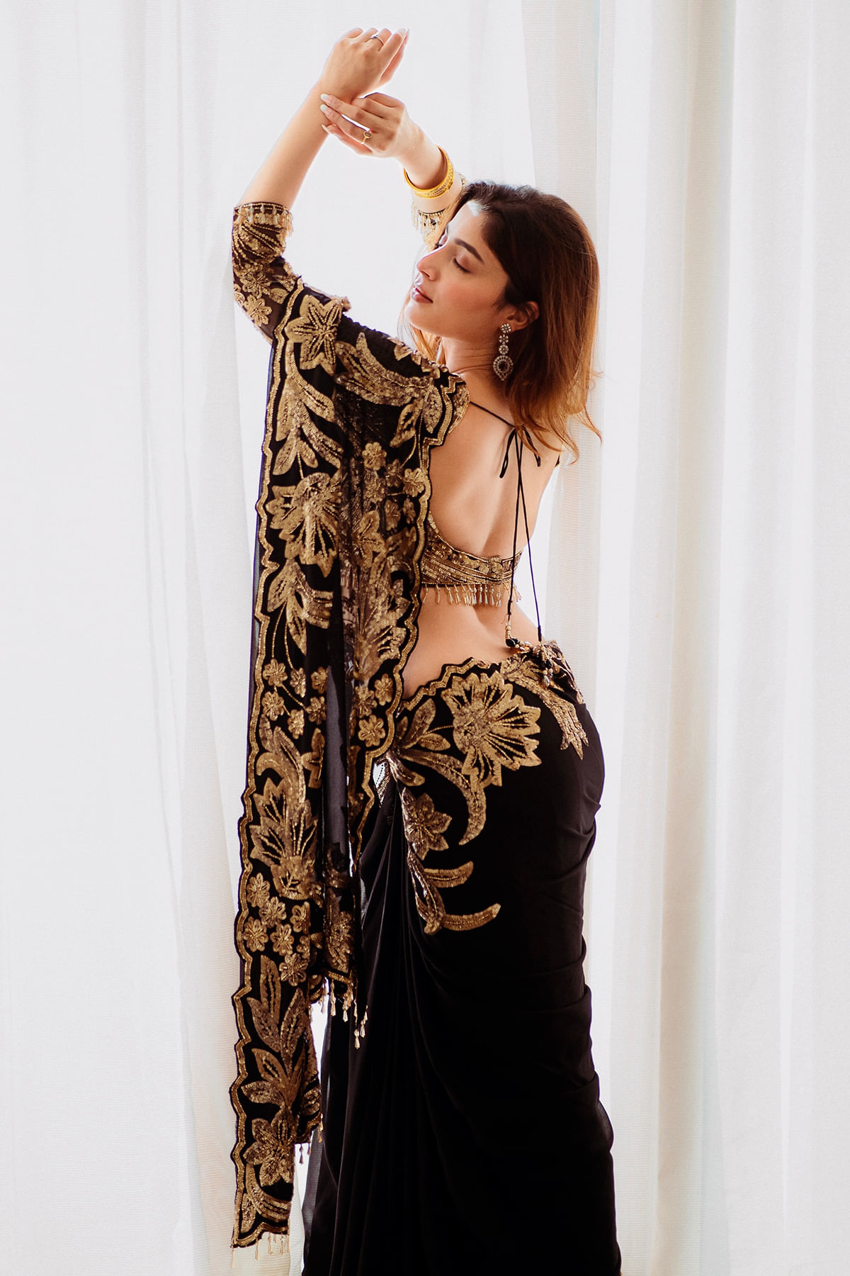 Urvashi in Black Designer Saree