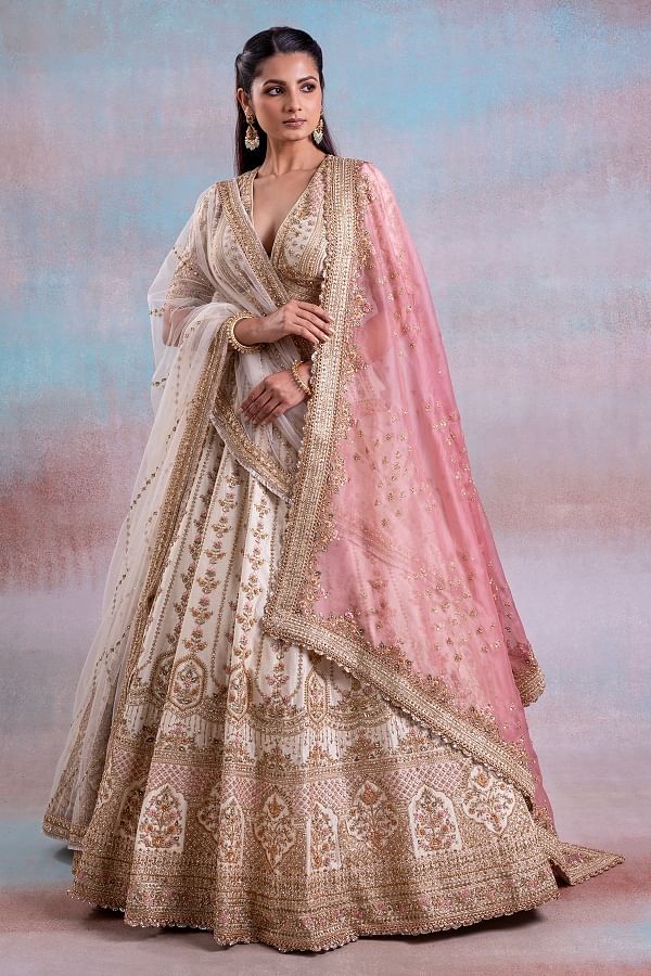 Buy Astounding Light Pink Embroidered Banarasi Silk Bridal Lehenga Choli  From Zeel Clothing.